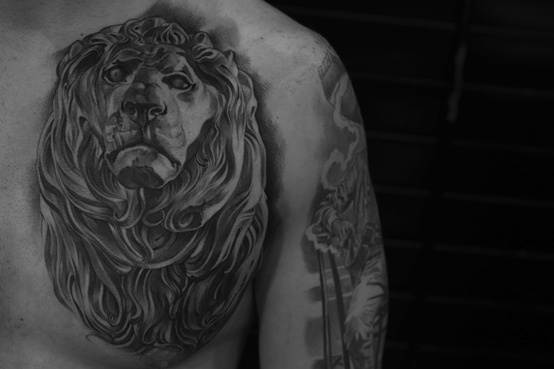 lion-statue-tattoo